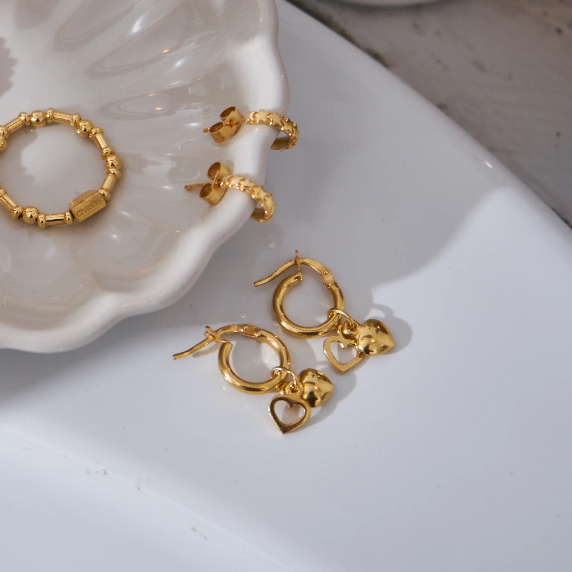 Tiny Multi Star Huggie Hoops - Image 8